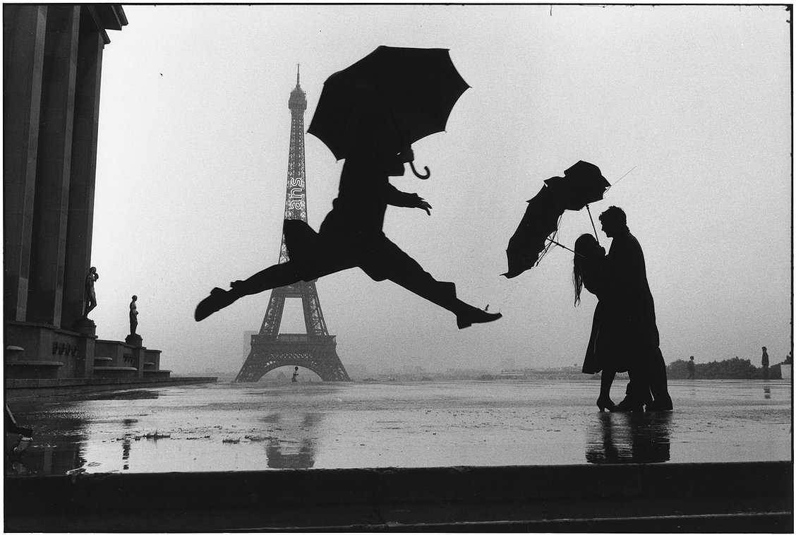 Elliott Erwitt Paris, France 1989 (umbrella jump)