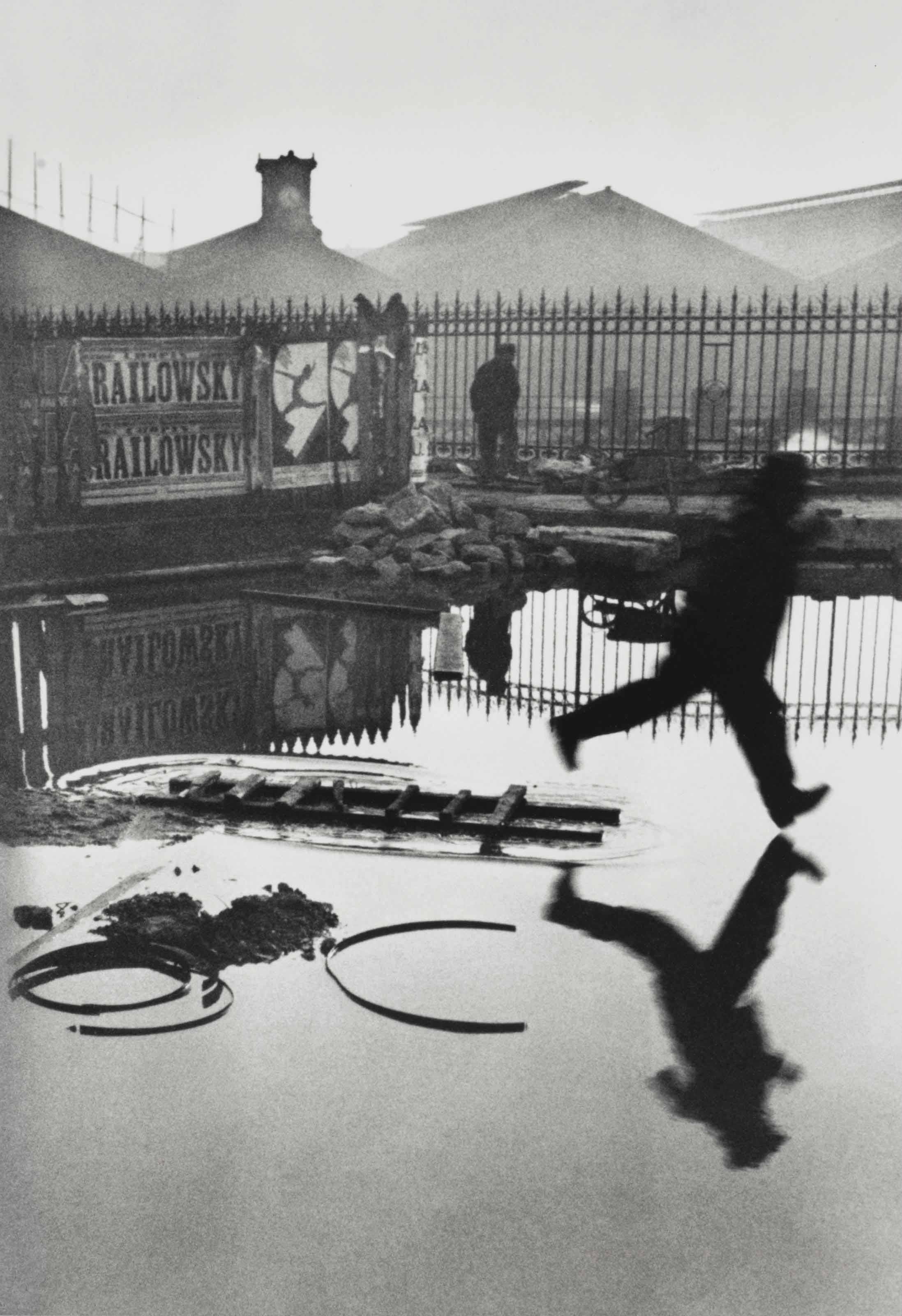 Henri_Cartier-Bresson_Behind_the_Gare_St_Lazare_Paris_1932_Catherine_Couturier_Gallery